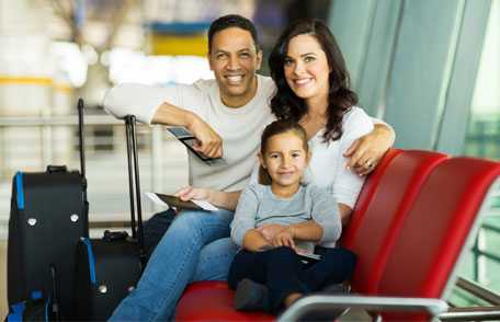 Mother, father and daughter at airport