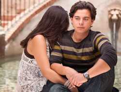 Young couple with woman hiding her face