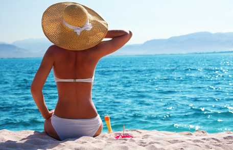 Woman sitting on beach