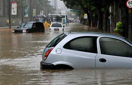 Flooded street with cars