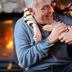 Grandson hugging grandfather