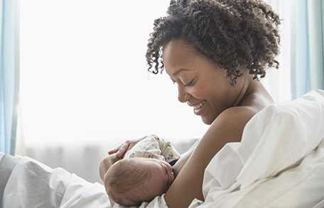 a baby breastfeeding