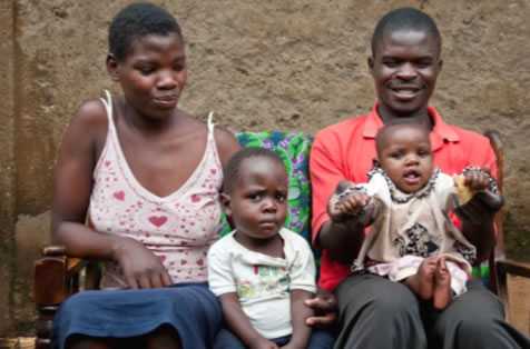 Lillian with her first born, Emmanuel, and Eric with Rose