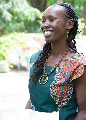 Mercy Njeru is one of 12 FELTP Kenya residents selected of 150 applicants for the positions. Here she helps to register attendees to the AFENET conference in Mombasa, Kenya. © David Synder