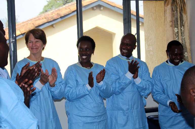 	Hon. Min Gashumba with Dr. MacDonald, Dr. Gatare and other NCBT staff during a tour of the NCBT facility.