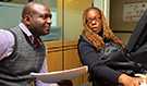 Dr. Amadou Traore of Guinea shadows Watch Officer Cassandra Rolle at the Watch Desk in CDC’s EOC. 