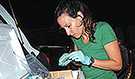 Ashley Greiner (Global RRT Tier 1 Emergency Public Health Epidemiologist) worked long hours in the aftermath of Hurricane Matthew. Dr. Greiner is seen here checking samples labels before sending them to the Port au Prince national laboratory for testing in October 2016 (Photo courtesy of Coralie Giese)