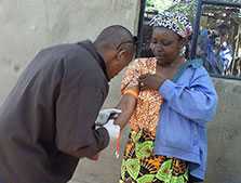 Tanzania FELTP resident Dr. Prosper Njau collecting a blood sample from a suspected brucellosis case in Kiteto District, Tanzania. An outbreak of brucellosis in humans was reported from the district in May 2012. It was found that slaughterhouse workers were more affected.