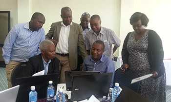 Participants conducting group work during the zoonotic disease prioritization workshop, Kenya, September 2015