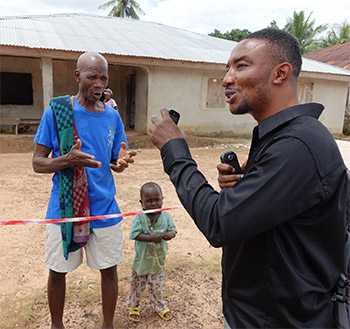 Ebola responder conducting contact tracing in Sierra Leone.