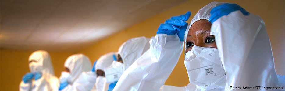 Training on the use of personal protective equipment. Photo Credit: Patrick Adams/RTI International