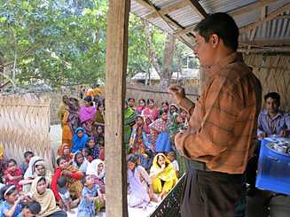 Conducting community education to raise awareness of the dangers of drinking raw date palm sap, which is associated with Nipah virus transmission