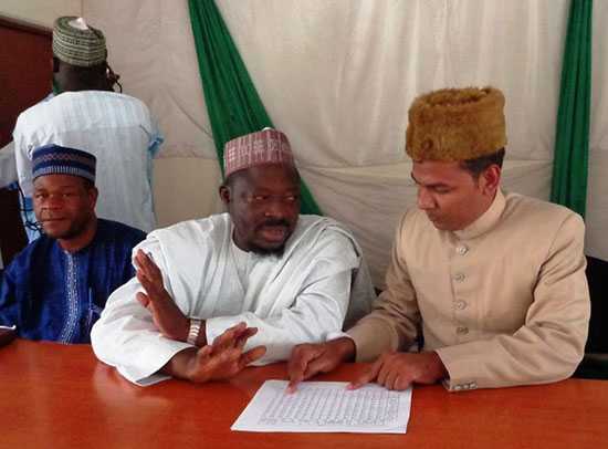 	Shafeeque Ahmad (STOP Volunteer) and religious focal persons compiling a list of mosques and schools which promote polio vaccination