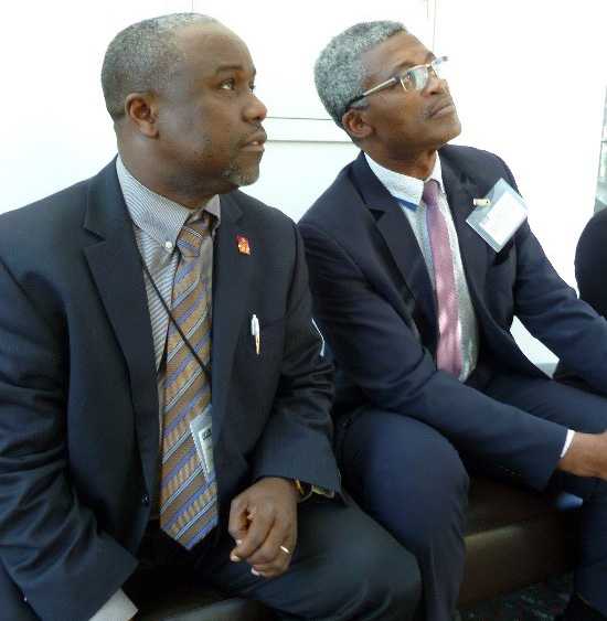 	Dr. Omer Pasi, DGHP Country Director in Cameroon, and Cameroon Ministry of Health official Dr. Georges Alain Mballa Etoundi at the CDC GHSA/Ebola Grantee Meeting, February 2016.