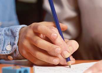 	Child learning to write. 