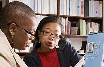 	A Diabetic listening to a community health worker familiar with the necessary diet needed to maintain control over the detrimental effects of this disease. 