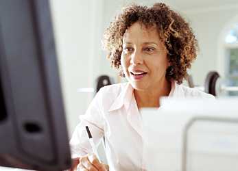 Woman learning in front of computer