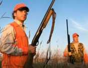 Group of hunters in field