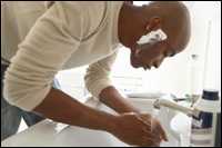 A man shaving.