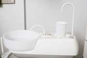 	Photo of dental wash basin with faucet