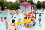 Kids playing in a water play area.