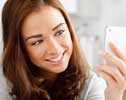 	A teenage girl posing for smartphone camera