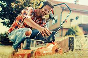 Man with lawn mower