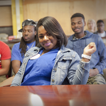 Young lady sitting at school desk