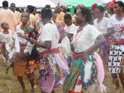 Dancers in Nigeria, the country where the Adisa family went to visit friends and relatives.