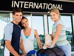 Three young adults at an airport