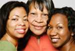 Three woman smiling