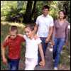 A family walking in a forest