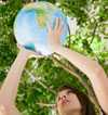 Woman holding globe