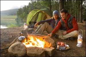 A man and a woman camping