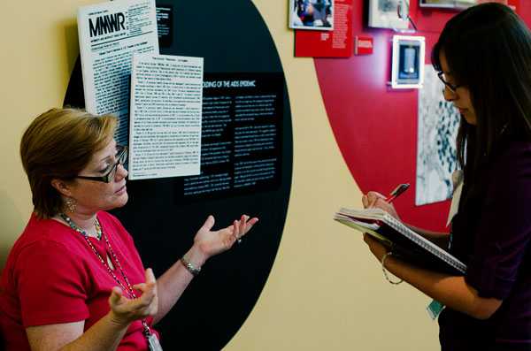 Simulated outbreak victim gives information to Disease Detective Camper.