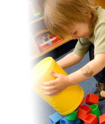 A boy playing with blocks