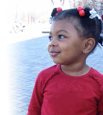 A little girl in a red shirt