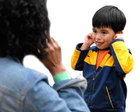 Woman playing with child