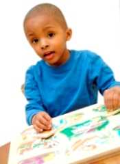 Photo: Child working at desk