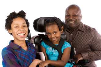 Photo of parents with child who has cerebral palsy