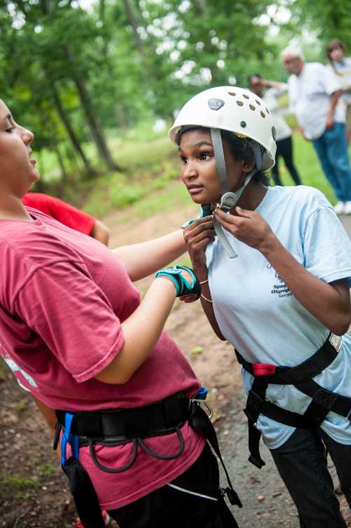 A young woman in safety gear