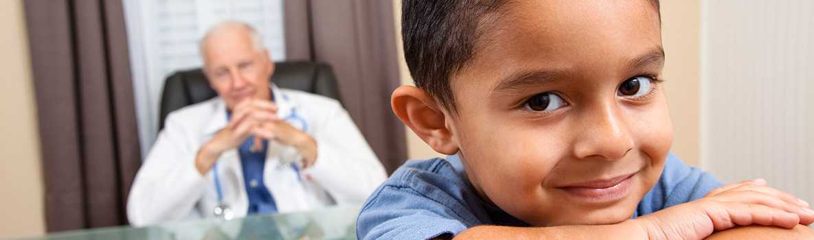 Hispanic boy in doctor's office