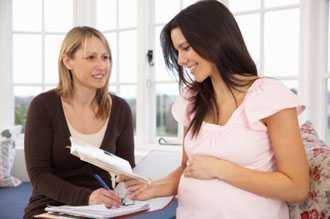 woman talking to doctor