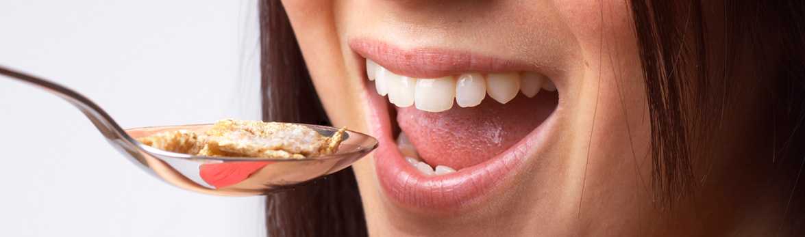 Woman eating cereal