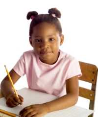 Photo: Girl sitting in a desk