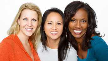 Three women smiling