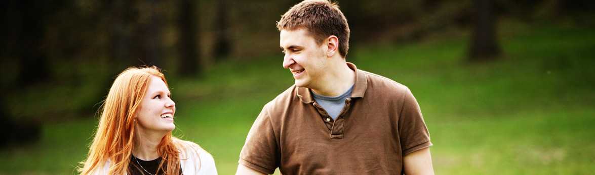 Couple walking and smiling