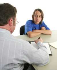 Student and teacher having a conference