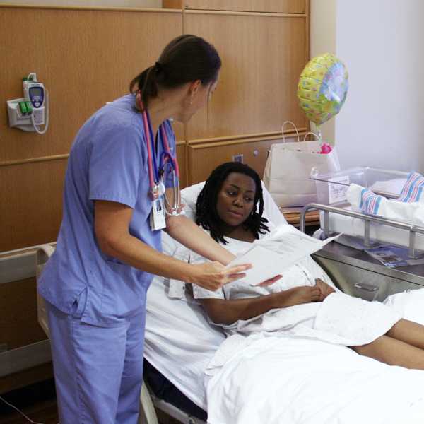 Doctor talking to her patient