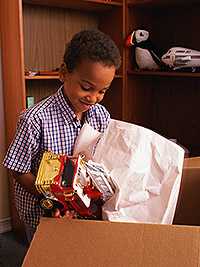 boy playing with a toy truck